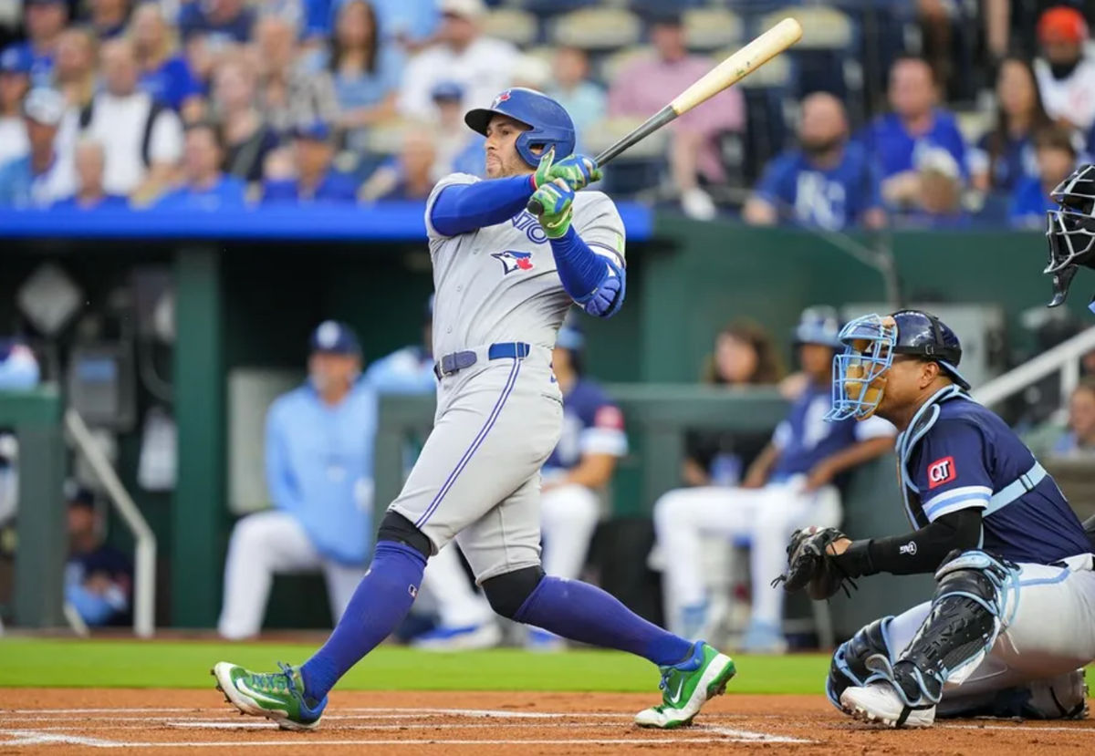 Sep 19, 2025; Kansas City, Missouri, USA; Toronto Blue Jays designated hitter George Springer (4) hits a home run during the first inning against the Kansas City Royals at Kauffman Stadium. Mandatory Credit: Jay Biggerstaff-Imagn Images