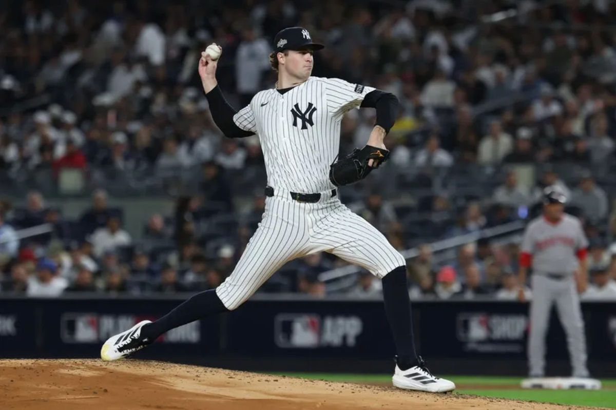 Oct 2, 2025; Bronx, New York, USA; New York Yankees starting pitcher Cam Schlittler (31) throws to the plate in the third inning against the Boston Red Sox during game three of the Wildcard round for the 2025 MLB playoffs at Yankee Stadium. Mandatory Credit: Vincent Carchietta-Imagn Images