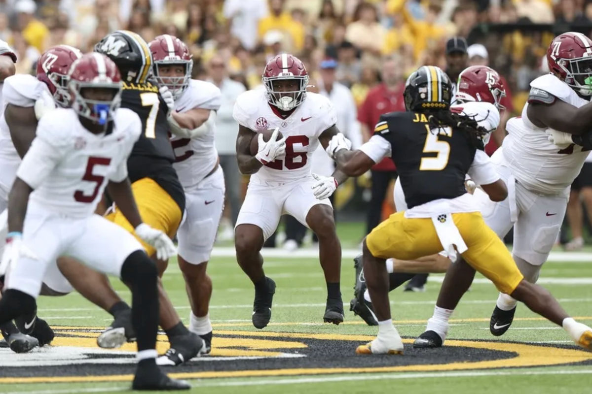Oct 11, 2025; Columbia, Missouri, USA; Alabama Crimson Tide running back Jamarion Miller (26) runs the ball against the Missouri Tigers during the first half at Faurot Field at Memorial Stadium. Mandatory Credit: Reese Strickland-Imagn Images