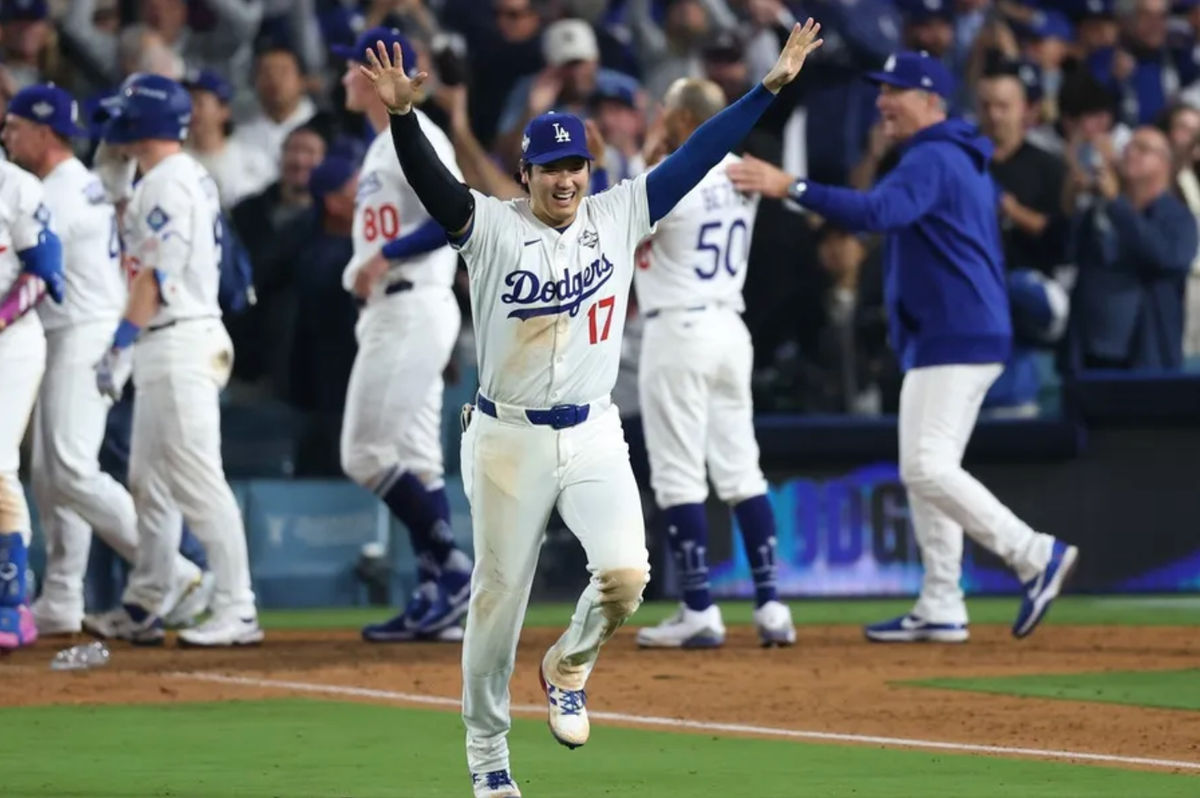 Oct 27, 2025; Los Angeles, California, USA; Los Angeles Dodgers designated hitter Shohei Ohtani (17) celebrates after winning in the eighteenth inning against the Toronto Blue Jays in game three of the 2025 MLB World Series at Dodger Stadium. Mandatory Credit: Kiyoshi Mio-Imagn Images