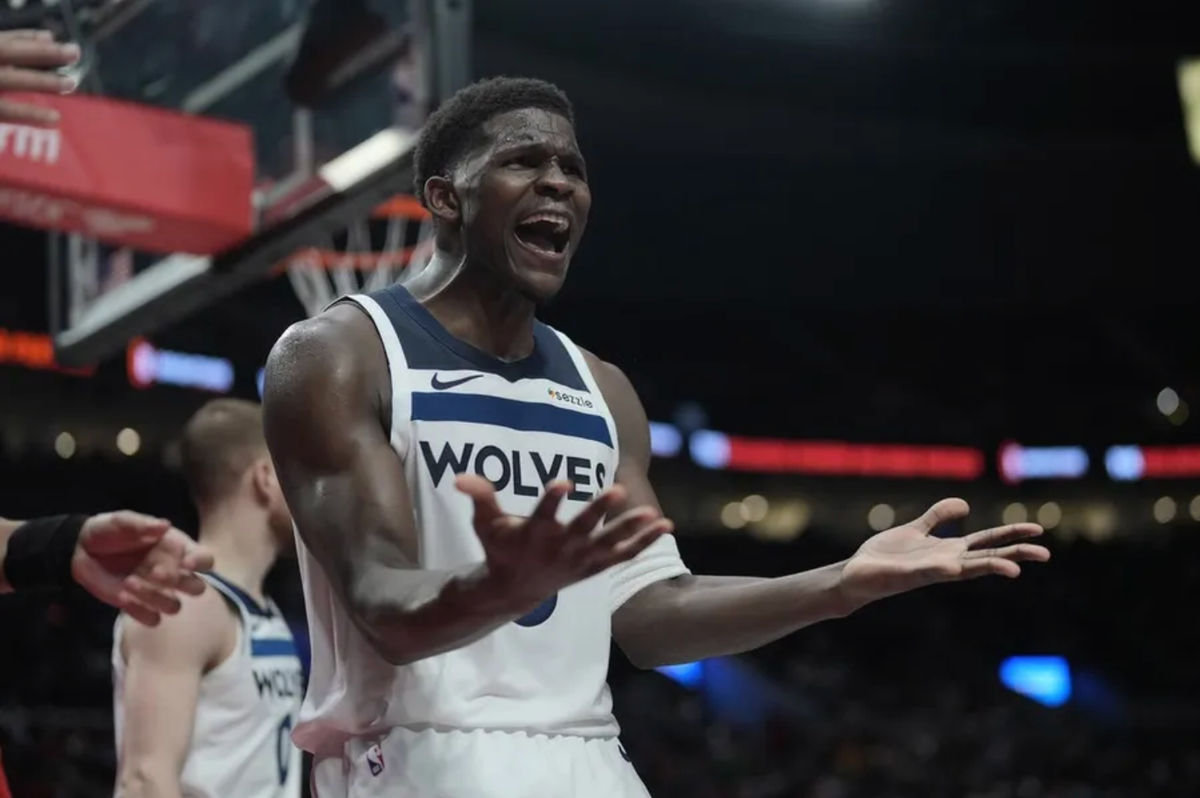 Nov 12, 2024; Portland, Oregon, USA; Minnesota Timberwolves shooting guard Anthony Edwards (5) reacts after a play during the second half against the Portland Trail Blazers at Moda Center. Mandatory Credit: Soobum Im-Imagn Images