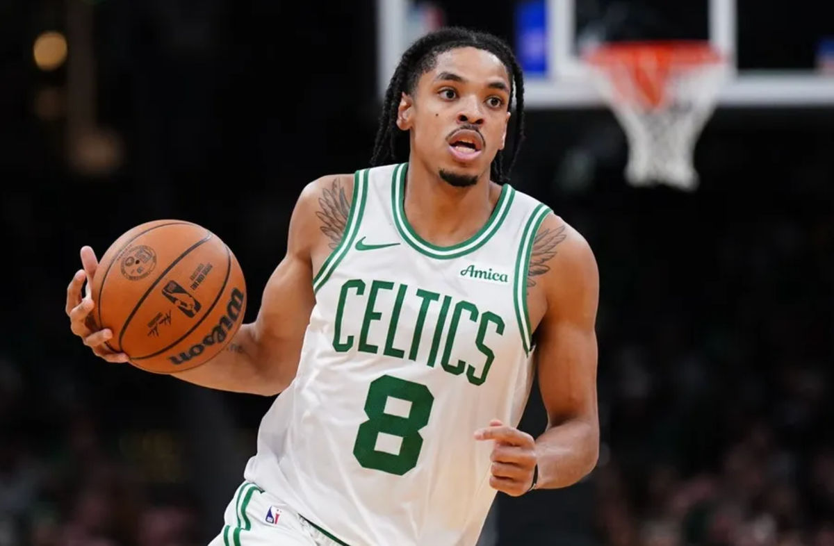 Nov 5, 2025; Boston, Massachusetts, USA; Boston Celtics forward Josh Minott (8) returns the ball against the Washington Wizards in the second half at TD Garden. Mandatory Credit: David Butler II-Imagn Images
