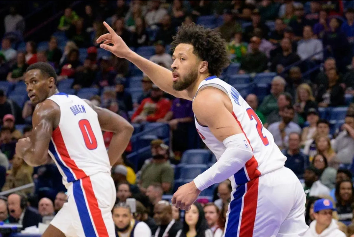 Mar 17, 2025; New Orleans, Louisiana, USA; Detroit Pistons guard Cade Cunningham (2) reacts after a score next to center Jalen Duren (0) during the first half against the New Orleans Pelicans at Smoothie King Center. Mandatory Credit: Matthew Hinton-Imagn Images