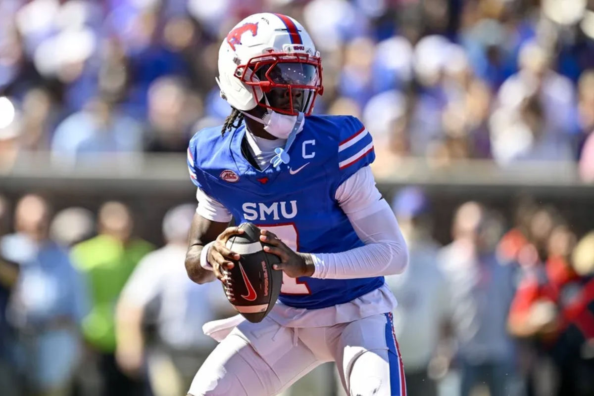 Oct 4, 2025; Dallas, Texas, USA; SMU Mustangs quarterback Kevin Jennings (7) drops back to pass the ball during the first half against the Syracuse Orange at Gerald J. Ford Stadium. Mandatory Credit: Jerome Miron-Imagn Images