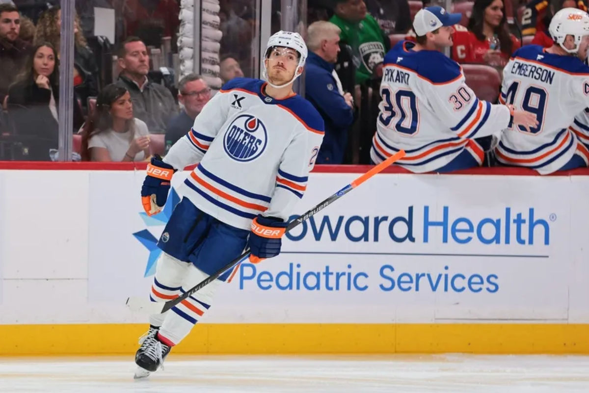 Nov 22, 2025; Sunrise, Florida, USA; Edmonton Oilers center Jack Roslovic (28) looks on after scoring against the Florida Panthers during the first period at Amerant Bank Arena. Mandatory Credit: Sam Navarro-Imagn Images