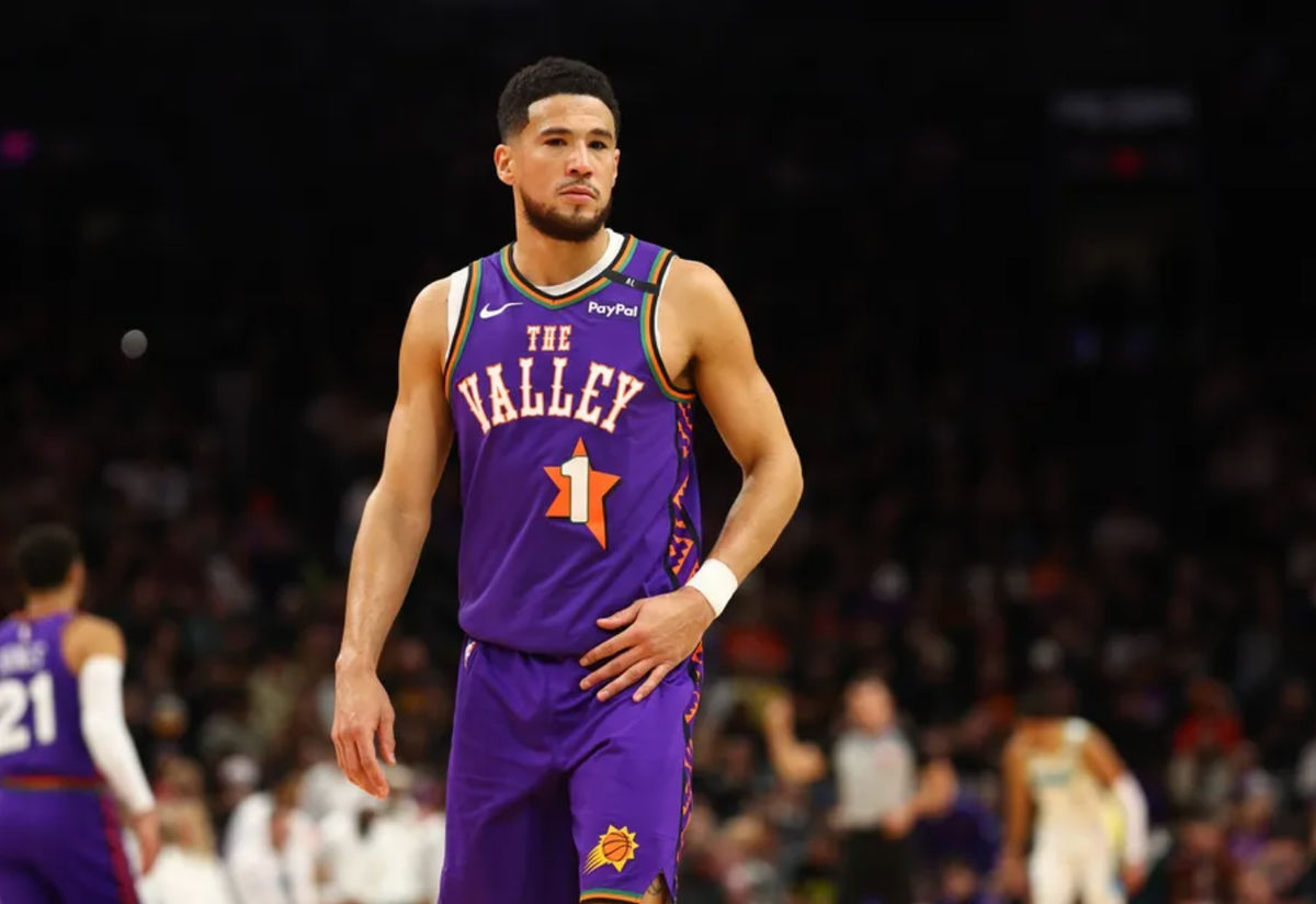 Dec 19, 2024; Phoenix, Arizona, USA; Phoenix Suns guard Devin Booker (1) against the Indiana Pacers at Footprint Center. Mandatory Credit: Mark J. Rebilas-Imagn Images