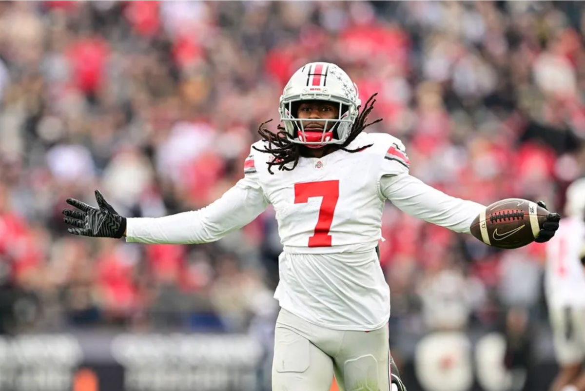 Nov 8, 2025; West Lafayette, Indiana, USA; Ohio State Buckeyes cornerback Jermaine Mathews Jr. (7) celebrates an interception during the second quarter against the Purdue Boilermakers at Ross-Ade Stadium. Mandatory Credit: Marc Lebryk-Imagn Images