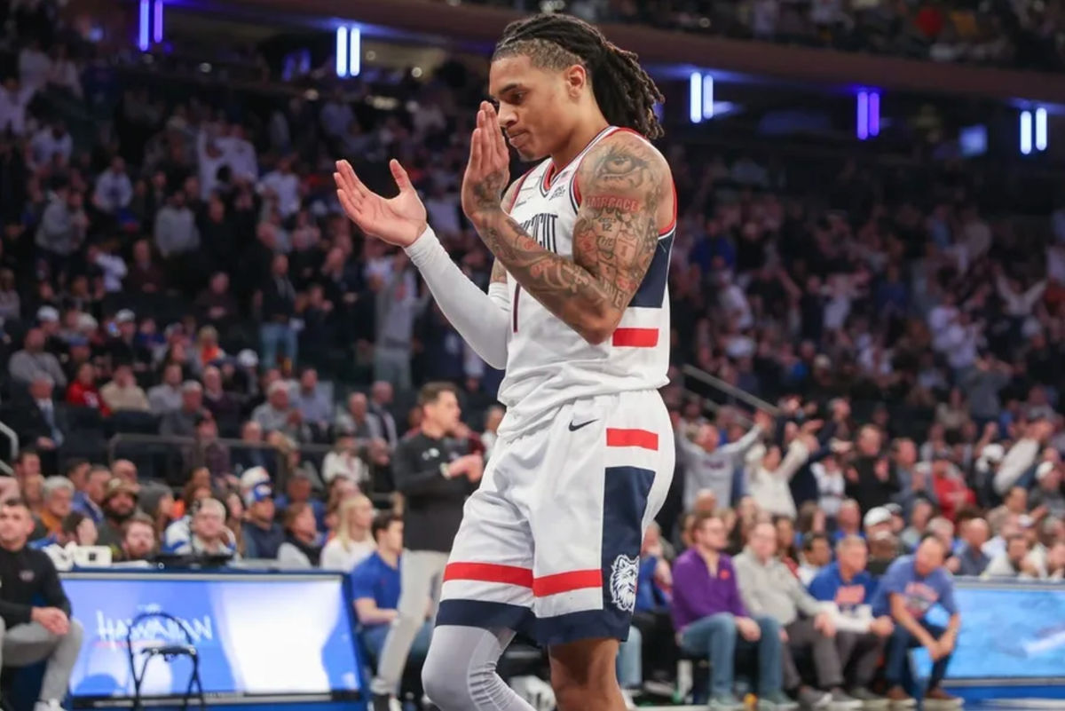 Dec 9, 2025; New York, New York, USA; UConn Huskies guard Solo Ball (1) celebrates in the second half against the Florida Gators at Madison Square Garden. Mandatory Credit: Wendell Cruz-Imagn Images