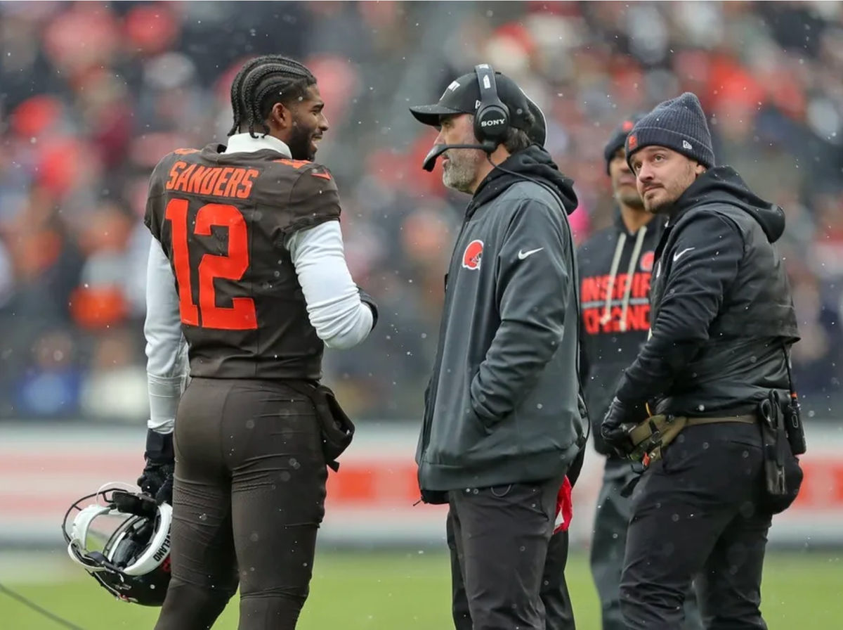 Cleveland Browns quarterback Shedeur Sanders (12) talks with coach Kevin Stefanski during a game against the Tennessee Titans on Dec. 7, 2025, in Cleveland. PHOTO USA TODAY SPORTS IMAGES