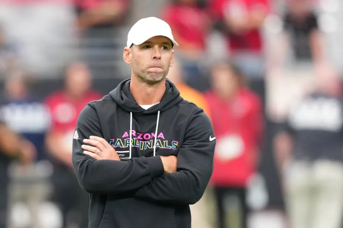 Oct 5, 2025; Glendale, Arizona, USA; Arizona Cardinals head coach Jonathan Gannon stands on the field before their game against the Tennessee Titans at State Farm Stadium. Mandatory Credit: Joe Camporeale-Imagn Images
