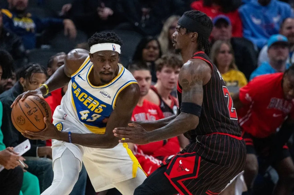 Nov 29, 2025; Indianapolis, Indiana, USA; Indiana Pacers forward Pascal Siakam (43) controls the ball against Chicago Bulls forward Emanuel Miller (2) during the first half at Gainbridge Fieldhouse. Mandatory Credit: Trevor Ruszkowski-Imagn Images