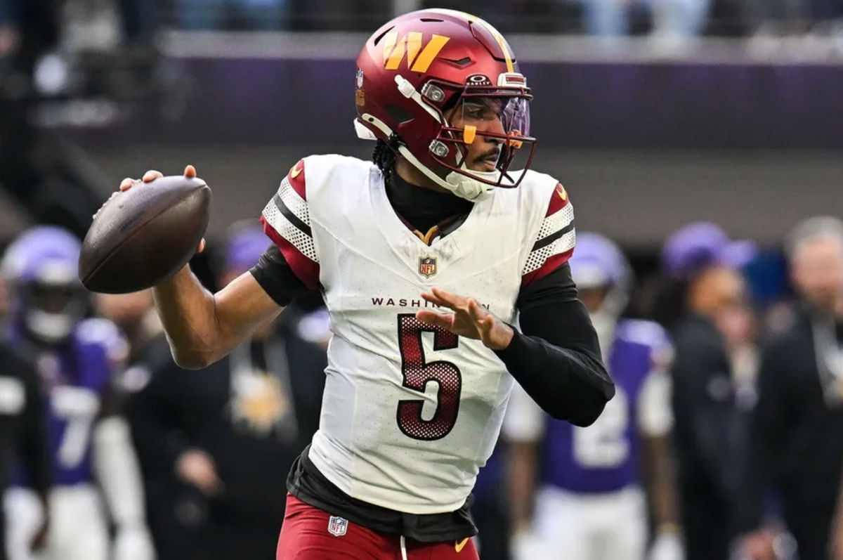 Dec 7, 2025; Minneapolis, Minnesota, USA; Washington Commanders quarterback Jayden Daniels (5) drops back to pass against the Minnesota Vikings during the first half at U.S. Bank Stadium. Mandatory Credit: Jeffrey Becker-Imagn Images