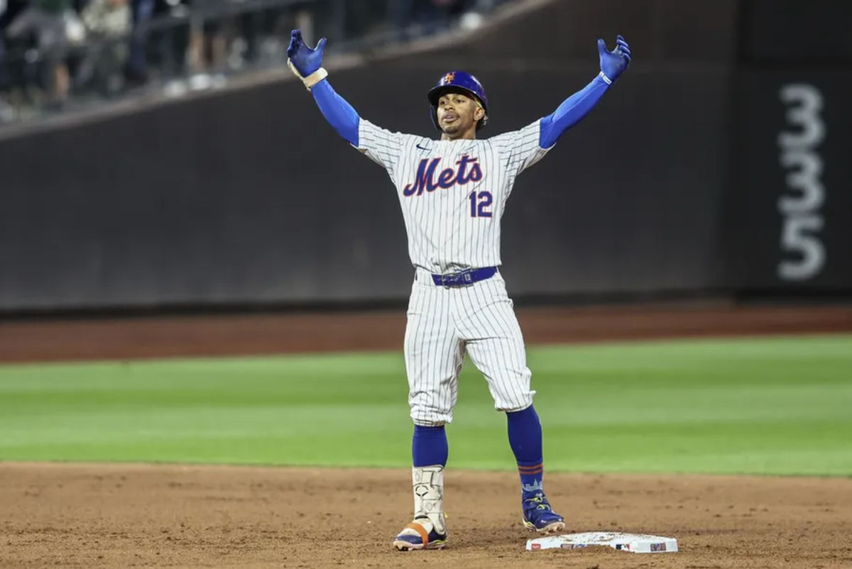 Sep 3, 2024; New York City, New York, USA; New York Mets shortstop Francisco Lindor (12) celebrates after hitting an RBI double in the eighth inning against the Boston Red Sox at Citi Field. Mandatory Credit: Wendell Cruz-Imagn Images