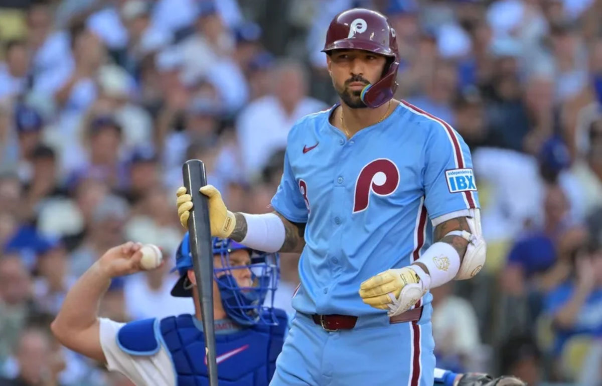 Oct 9, 2025; Los Angeles, California, USA; Philadelphia Phillies right fielder Nick Castellanos (8) reacts after striking out in the fifth inning against the Los Angeles Dodgers during game four of the NLDS round for the 2025 MLB playoffs at Dodger Stadium. Mandatory Credit: Jayne Kamin-Oncea-Imagn Images