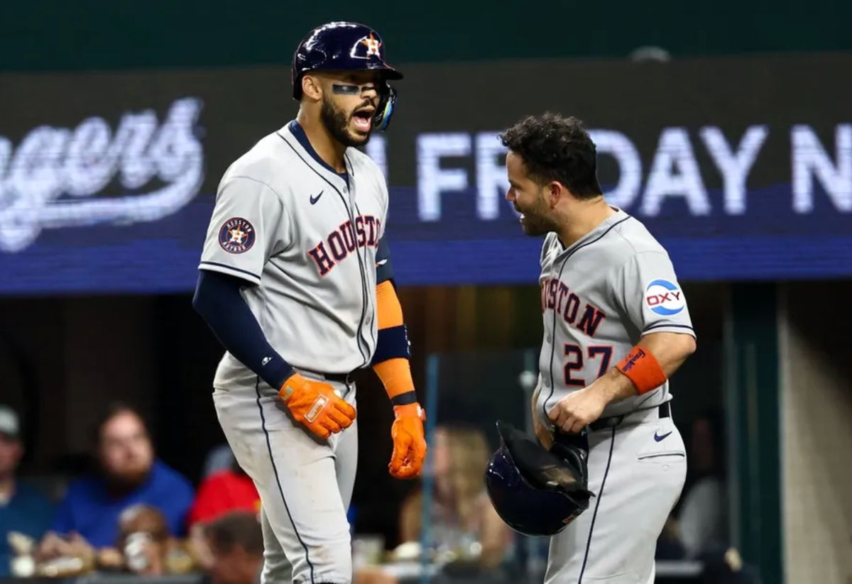 Sep 5, 2025; Arlington, Texas, USA; Houston Astros third baseman Carlos Correa (1) celebrates with Houston Astros second baseman Jose Altuve (27) after hitting a two-run home run during the eighth inning against the Texas Rangers at Globe Life Field. Mandatory Credit: Kevin Jairaj-Imagn Images