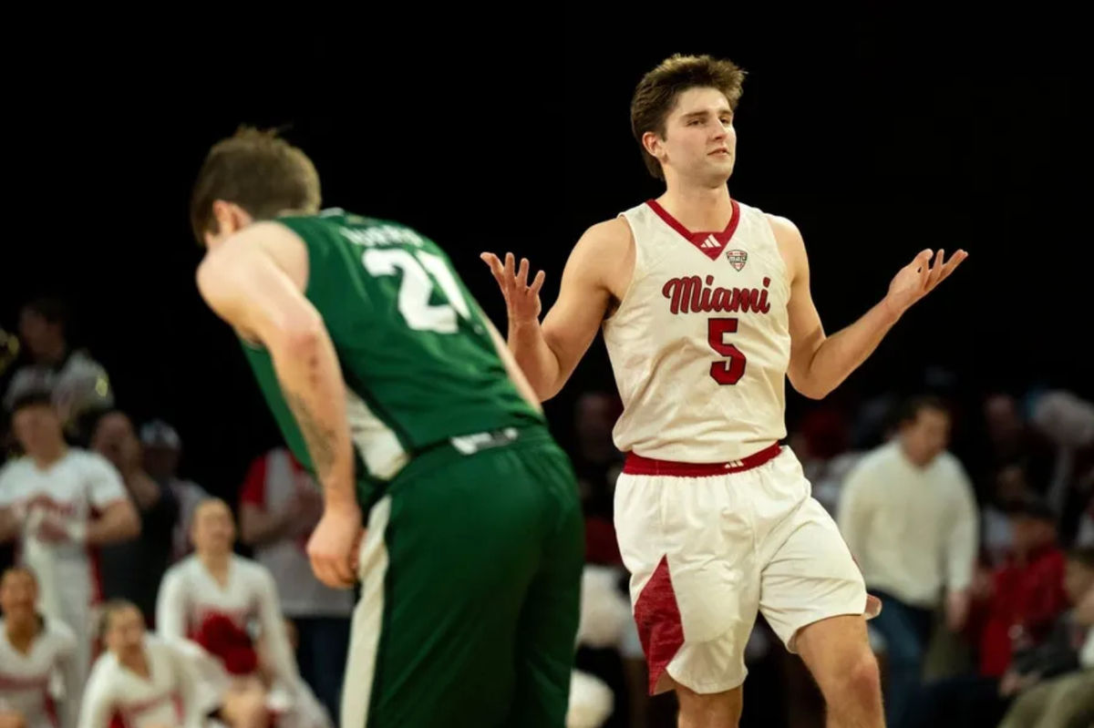Miami RedHawks guard Peter Suder (5) reacts after hitting a jump shot over Ohio Bobcats guard Jesse Burris (21) in the second half of the NCAA basketball game at Millett Hall in Oxford, Ohio, on Friday, Feb. 13, 2026.