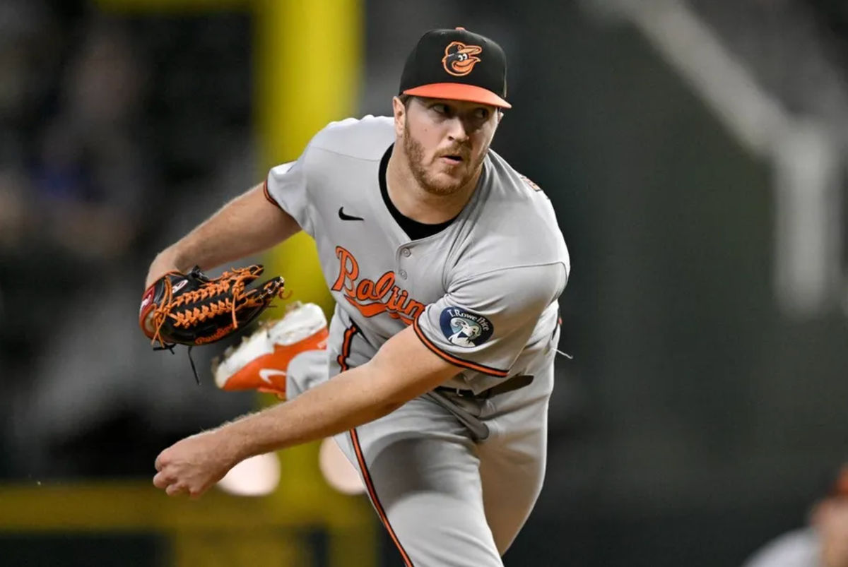 Jun 30, 2025; Arlington, Texas, USA; Baltimore Orioles starting pitcher Trevor Rogers (28) pitches against the Texas Rangers during the first inning at Globe Life Field. Mandatory Credit: Jerome Miron-Imagn Images