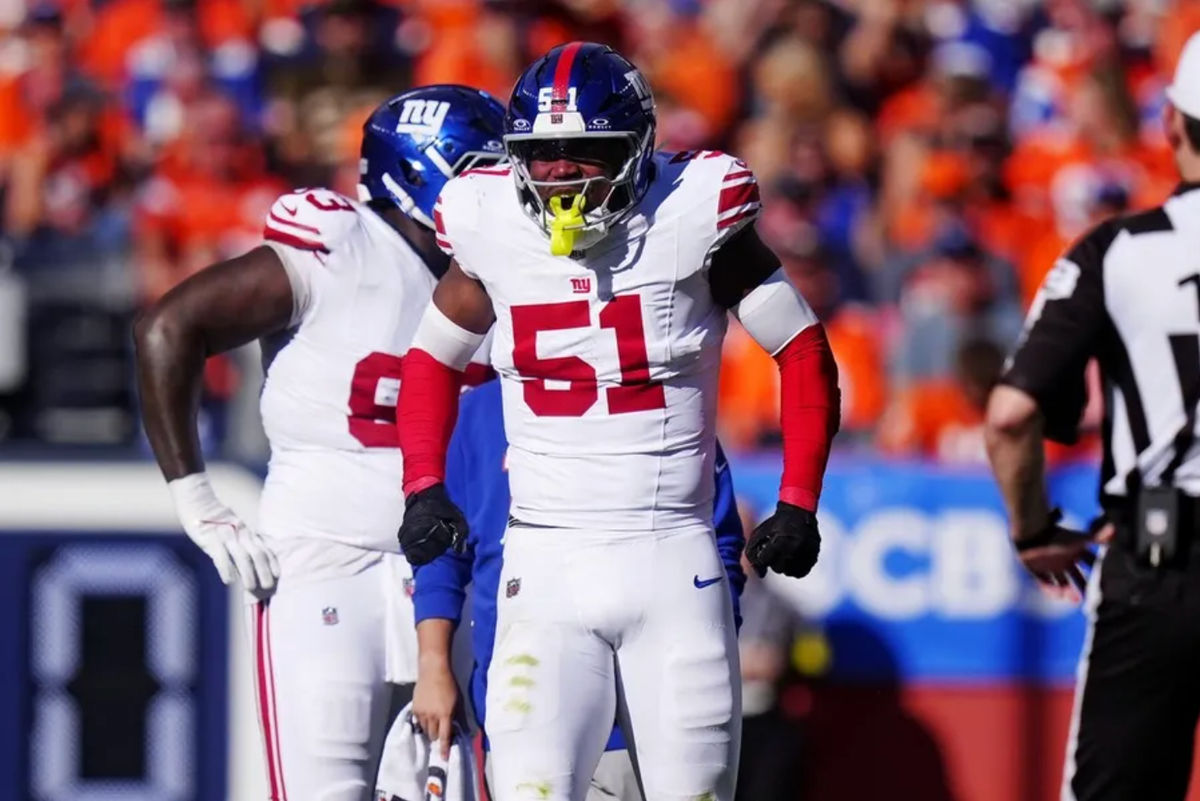 Oct 19, 2025; Denver, Colorado, USA; New York Giants linebacker Abdul Carter (51) reacts after a play against the Denver Broncos during the second half at Empower Field at Mile High. Mandatory Credit: Ron Chenoy-Imagn Images