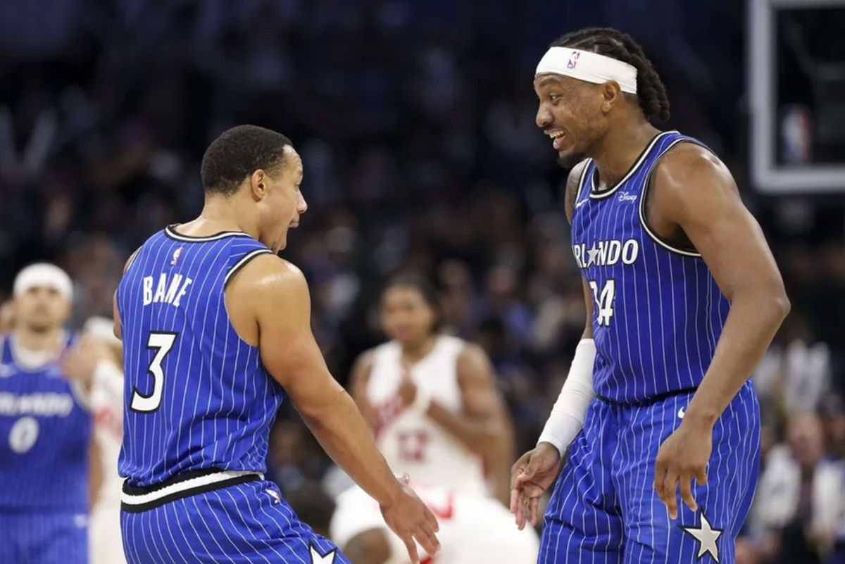 Jan 30, 2026; Orlando, Florida, USA; Orlando Magic guard Desmond Bane (3) and center Wendell Carter Jr. (34) react after basket against the Toronto Raptors in the fourth quarter at Kia Center. Mandatory Credit: Nathan Ray Seebeck-Imagn Images