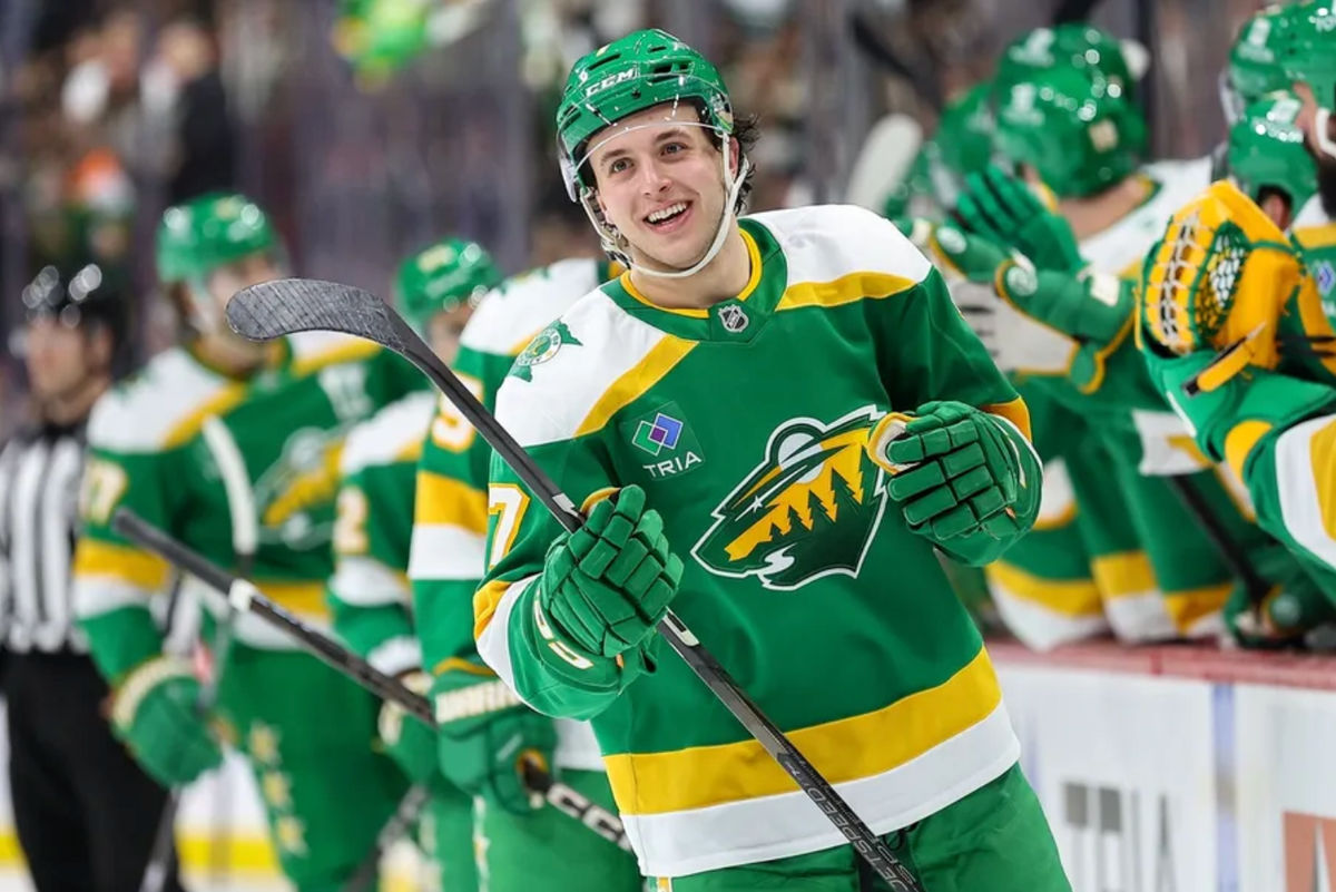 Dec 23, 2024; Saint Paul, Minnesota, USA; Minnesota Wild defenseman Brock Faber (7) celebrates his goal against the Chicago Blackhawks during the third period at Xcel Energy Center. Mandatory Credit: Matt Krohn-Imagn Images