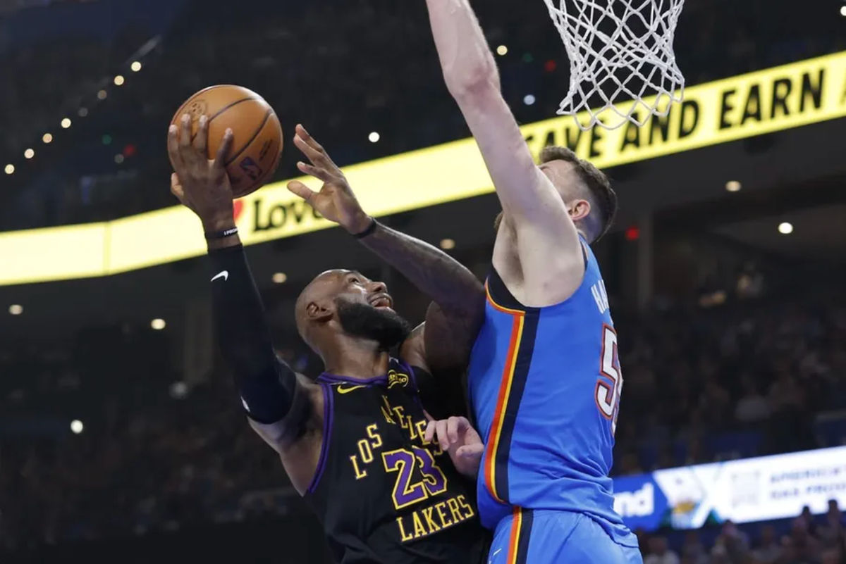 Apr 2, 2026; Oklahoma City, Oklahoma, USA; Los Angeles Lakers forward LeBron James (23) goes up for a basket as Oklahoma City Thunder center Isaiah Hartenstein (55) defends during the first quarter at Paycom Center. Mandatory Credit: Alonzo Adams-Imagn Images