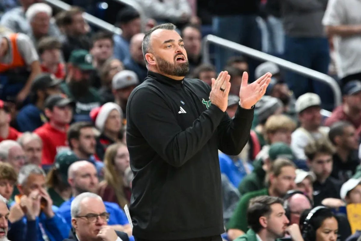 Mar 19, 2026; Buffalo, NY, USA; South Florida Bulls head coach Bryan Hodgson looks on during the second half against the Louisville Cardinals during a first round game of the men's 2026 NCAA Tournament at Keybank Center. Mandatory Credit: Mark Konezny-Imagn Images
