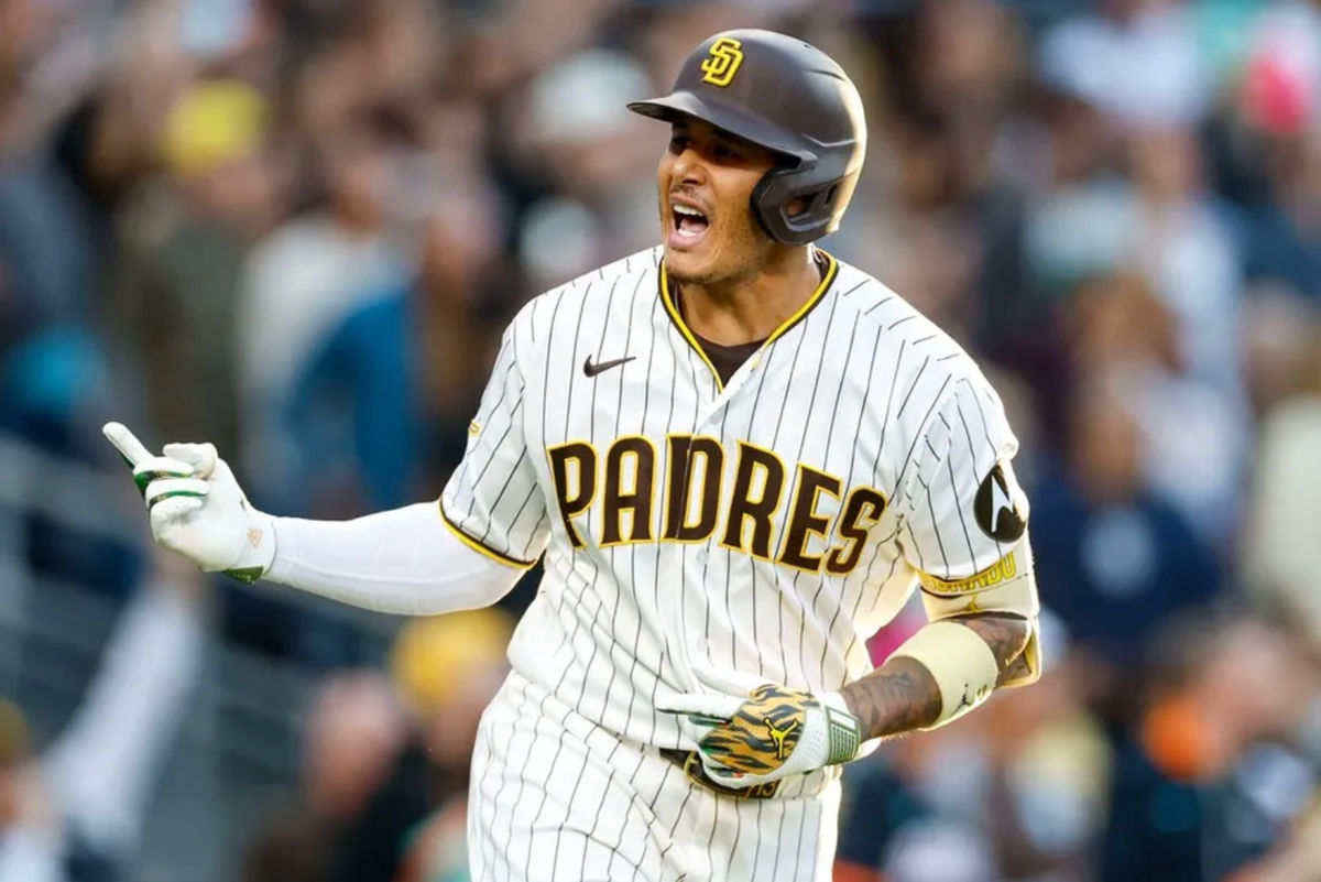 Apr 11, 2026; San Diego, California, USA; San Diego Padres third baseman Manny Machado (13) celebrates after hitting a two-run home run during the third inning against the Colorado Rockies at Petco Park. Mandatory Credit: David Frerker-Imagn Images