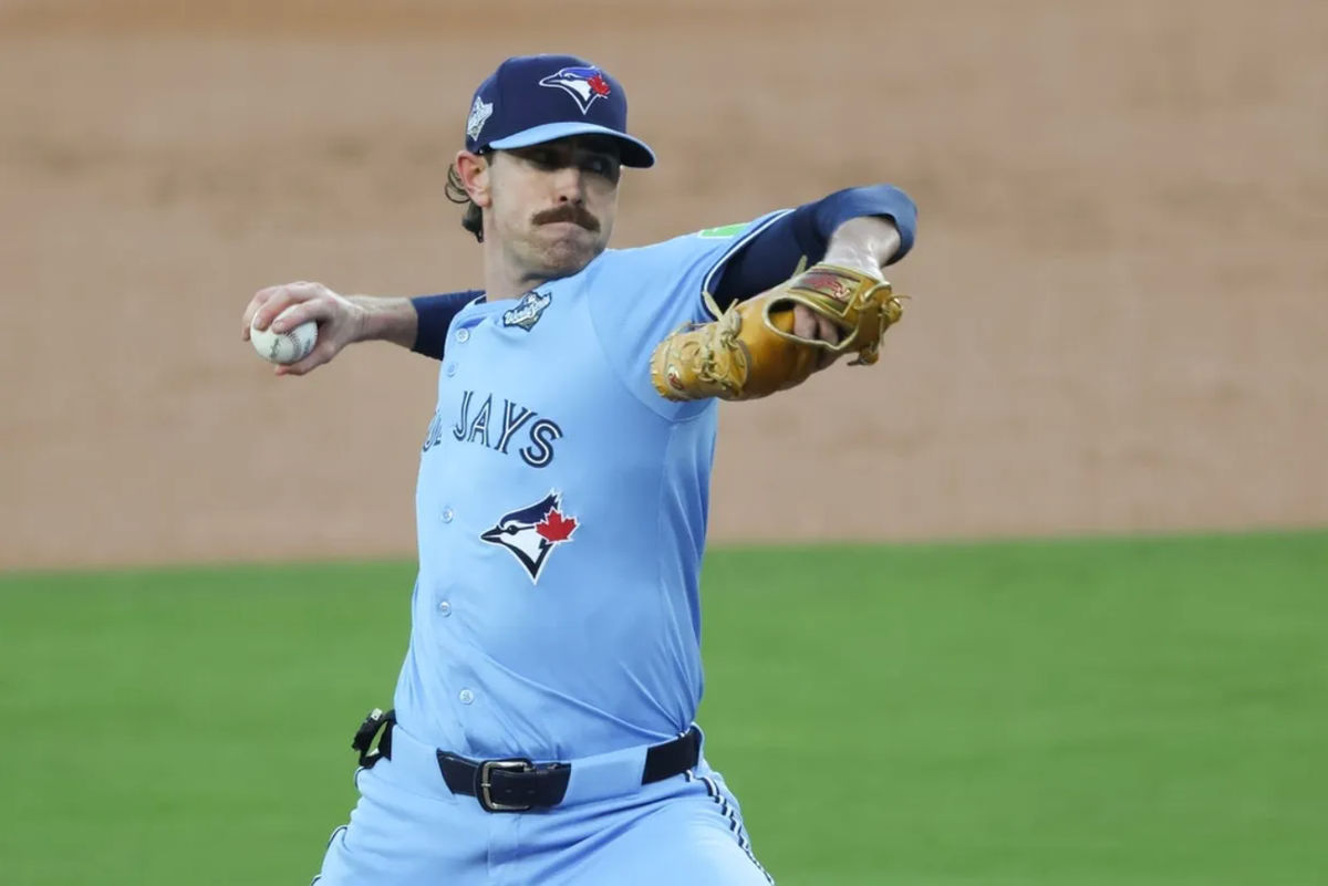 Oct 28, 2025; Los Angeles, California, USA; Toronto Blue Jays pitcher Shane Bieber (57) pitches during the first inning against the Los Angeles Dodgers during game four of the 2025 MLB World Series at Dodger Stadium. Mandatory Credit: Kiyoshi Mio-Imagn Images