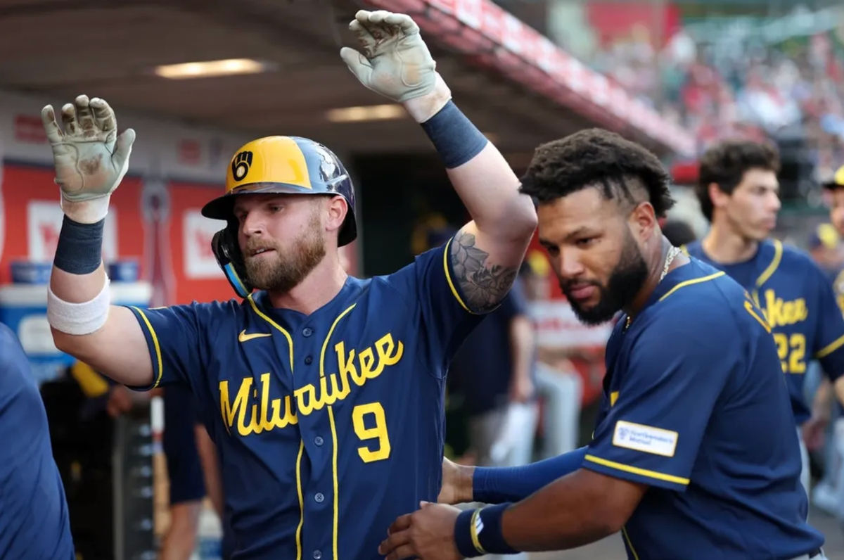 Aug 1, 2026; Anaheim, California, USA; Milwaukee Brewers right fielder Jake Bauers (9) is greeted by left fielder Jackson Chourio (11) in the dugout after hitting a home run during the fourth inning against the Los Angeles Angels at Angel Stadium. Mandatory Credit: Kiyoshi Mio-Imagn Images