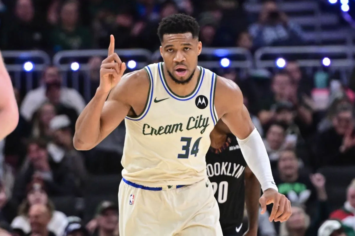 Nov 29, 2025; Milwaukee, Wisconsin, USA; Milwaukee Bucks forward Giannis Antetokounmpo (34) reacts after scoring his 21,000th career point in the third quarter against the Brooklyn Nets at Fiserv Forum. Mandatory Credit: Benny Sieu-Imagn Images
