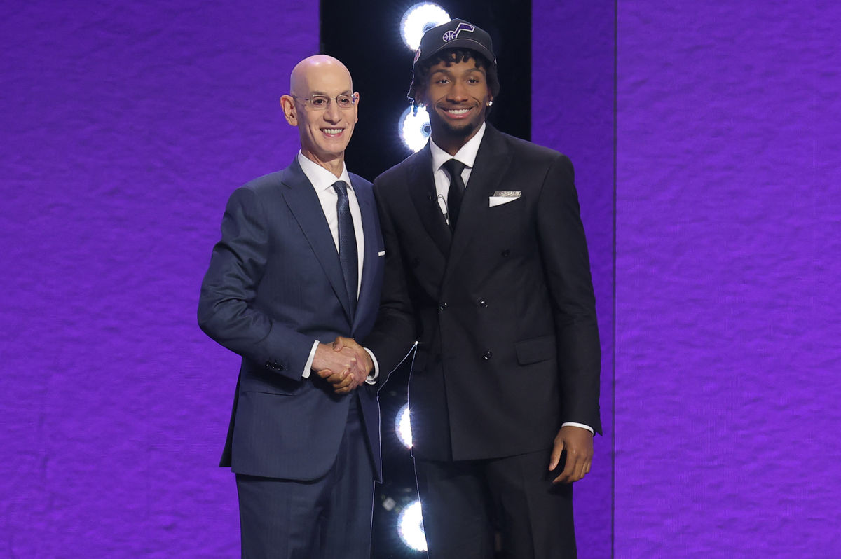 Jun 23, 2026; New York, NY, USA; NBA commissioner Adam Silver greets the second pick in the 2026 NBA draft, Kansas guard Darryn Peterson after he was selected by the Utah Jazz at Barclays Center. Mandatory Credit: Brad Penner-Imagn Images