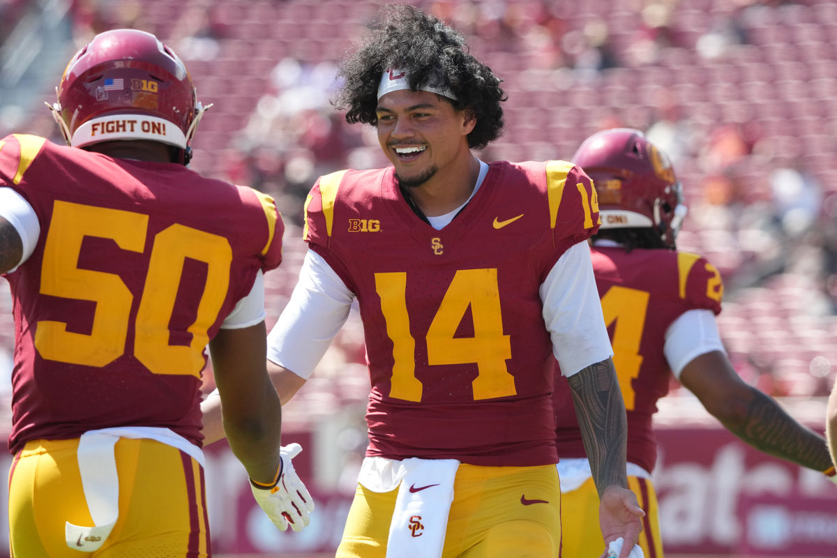 Aug 29, 2026; Los Angeles, California, USA; Southern California Trojans quarterback Jayden Maiava (14) and linebacker Taylor Johnson (50) react in the second half against the San Jose State Spartans at United Airlines Field at Los Angeles Memorial Coliseum. Mandatory Credit: Kirby Lee-Imagn Images