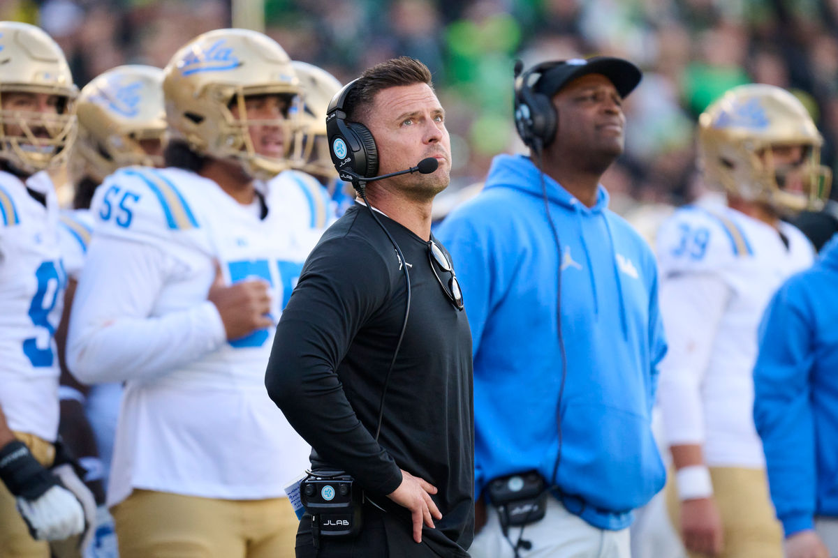 Oct 10, 2026; Eugene, Oregon, USA; UCLA Bruins head coach Bob Chesney watches a replay during the second half in a game against the Oregon Ducks at Autzen Stadium. Mandatory Credit: Troy Wayrynen-Imagn Images