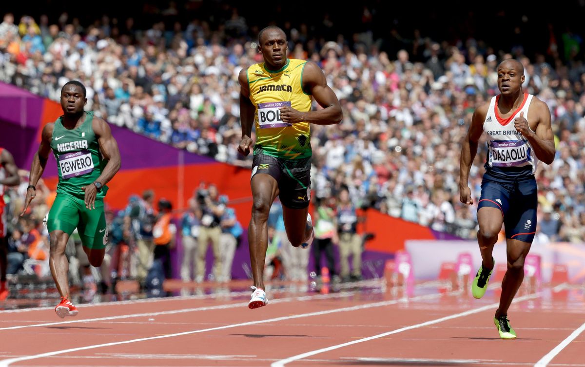 Photos Of Usain Bolt Looking Bored As He Blows Past The Best Runners In The World