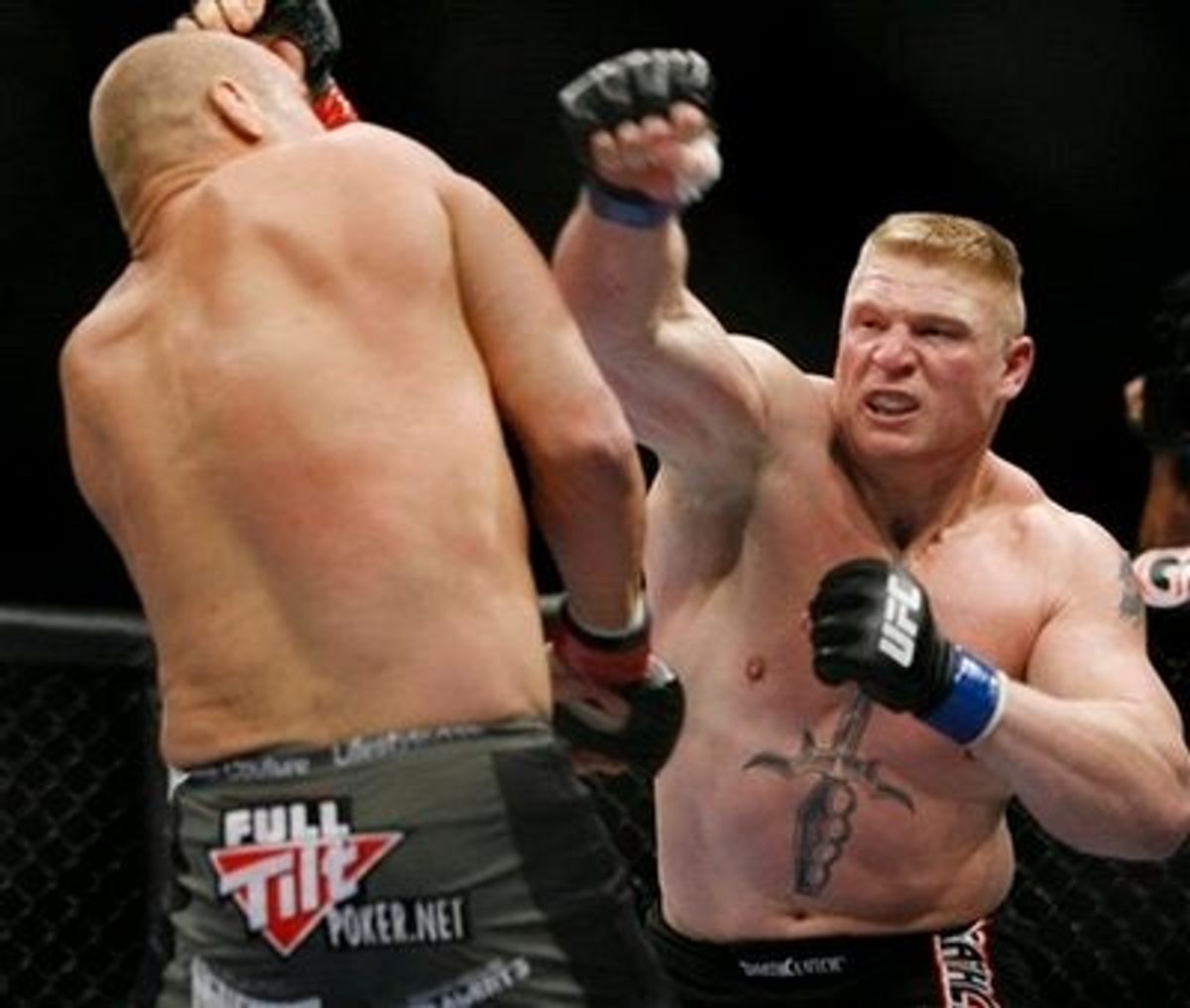 Brock Lesnar Knocks Out Randy Couture to Become UFC Heavyweight Champion