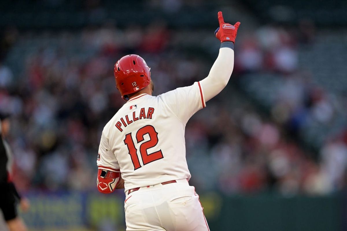 Cardinals score 8 runs in 7th inning to rally past Angels