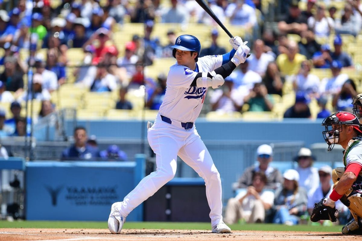 Shohei Ohtani hits winning single as Dodgers top Reds in 10
