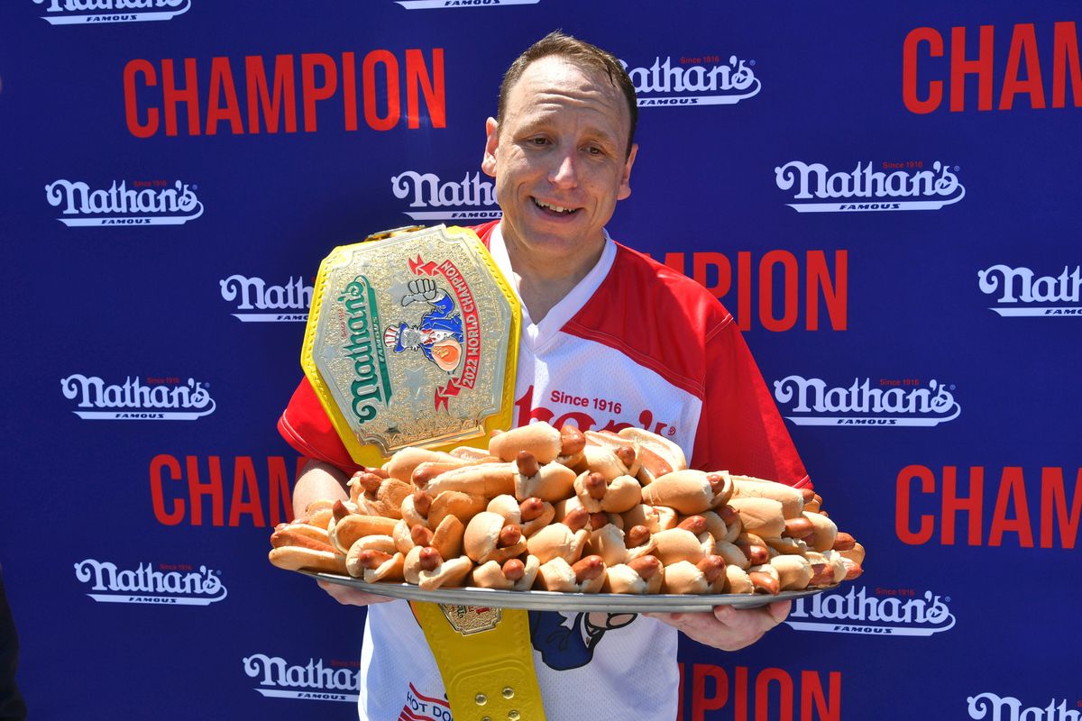 Joey Chestnut takes break to choke protestor en route to another hot dog contest win