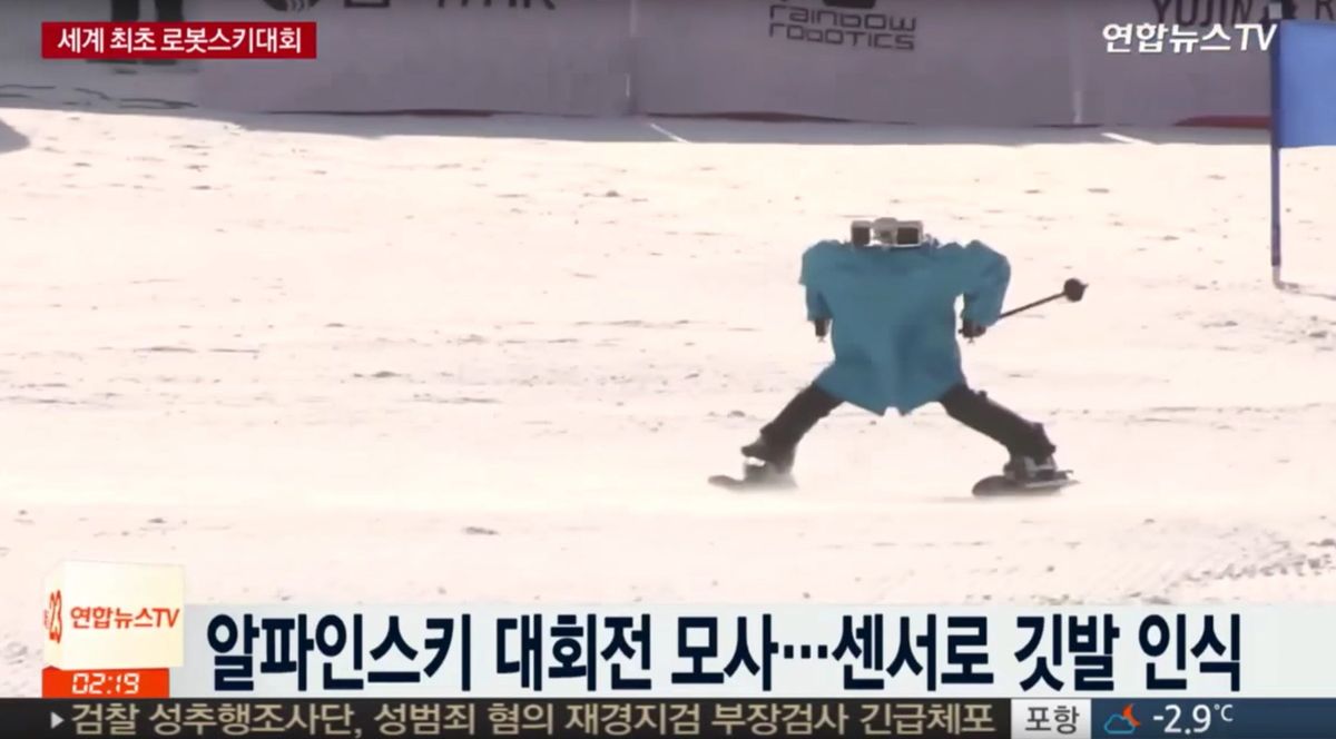 These Dumbass Robots In Sweaters Are Terrible At Skiing