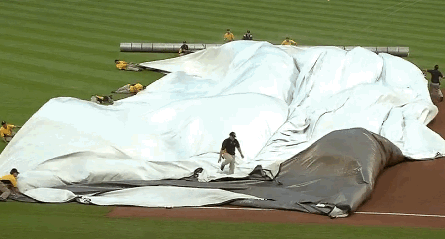 It Takes A Village To Secure An Infield Rain Tarp