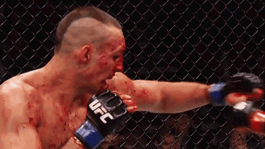 Lawler Retains Belt After Bloody Slugfest