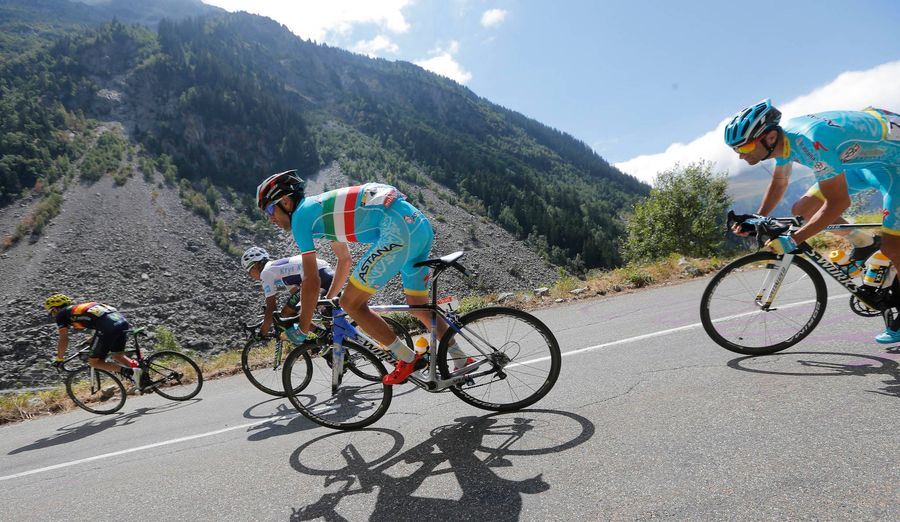 Cyclist Kicked Out Of Race For Holding Onto Car