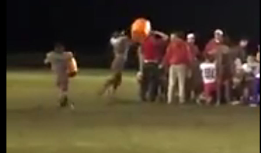 High School Football Player Chucks Gatorade Jug Into Postgame Huddle