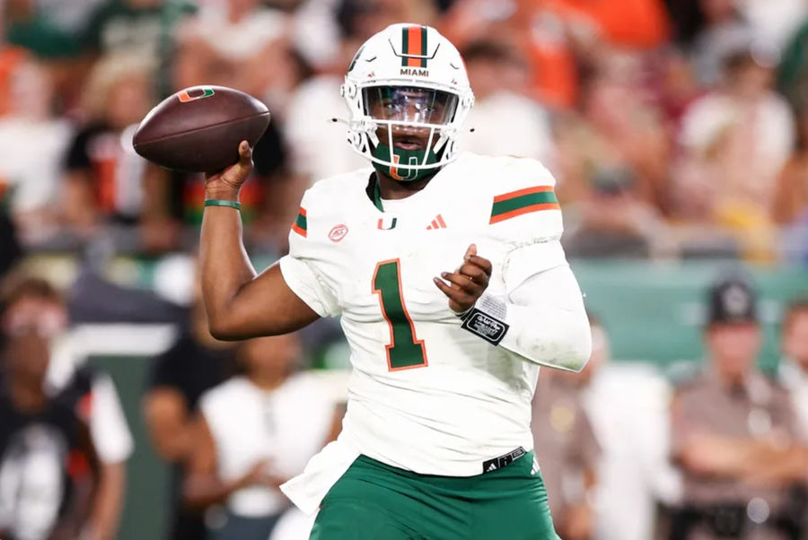 September 21, 2024; Tampa, FL, USA; Miami Hurricanes quarterback Cam Ward (1) drops back to pass during the second quarter against the South Florida Bulls at Raymond James Stadium. Mandatory Credit: Nathan Ray Seebeck-Imagn Images