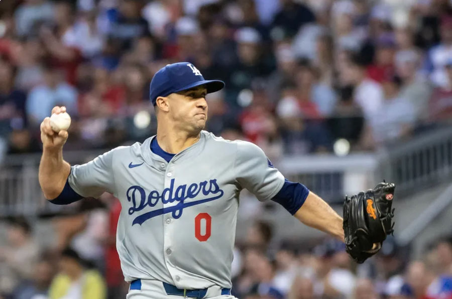 September 14, 2024; Cumberland, GA, USA; Los Angeles Dodgers pitcher Jack Flaherty (0) pitches during the first inning against the Atlanta Braves at Truist Park. Mandatory Credit: Jordan Godfree-Imagn Images