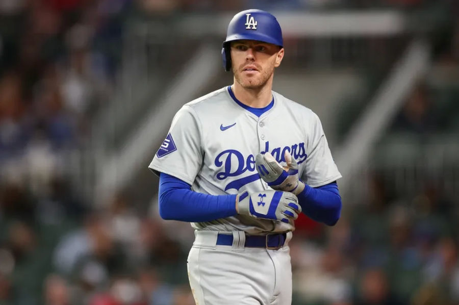 Sep 16, 2024; Atlanta, Georgia, USA; Los Angeles Dodgers first baseman Freddie Freeman (5) walks to the dugout after a called strikeout against the Atlanta Braves in the sixth inning at Truist Park. Mandatory Credit: Brett Davis-Imagn Images