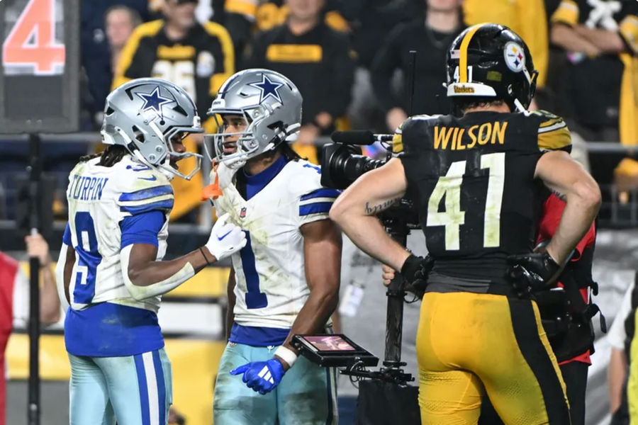 Oct 6, 2024; Pittsburgh, Pennsylvania, USA; Dallas Cowboys wide receiver Jalen Tolbert (1) celebrates with KaVontae Turpin (9) after scoring a touchdown in front of Pittsburgh Steelers linebacker Payton Wilson (41) during the fourth quarter at Acrisure Stadium. Mandatory Credit: Barry Reeger-Imagn Images