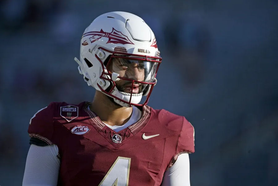 Sep 21, 2024; Tallahassee, Florida, USA; Florida State Seminoles quarterback DJ Uiagalelei (4) warms up before a game against the California Golden Bears at Doak S. Campbell Stadium. Mandatory Credit: Melina Myers-Imagn Images