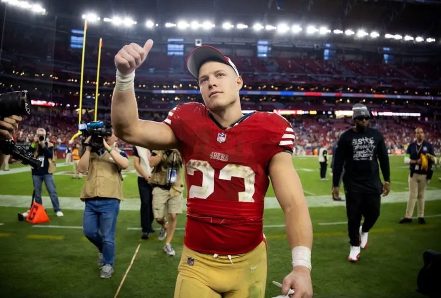 Dec 17, 2023; Glendale, Arizona, USA; San Francisco 49ers running back Christian McCaffrey (23) celebrates after beating the Arizona Cardinals at State Farm Stadium. credits: Mark J. Rebilas-USA TODAY Sports