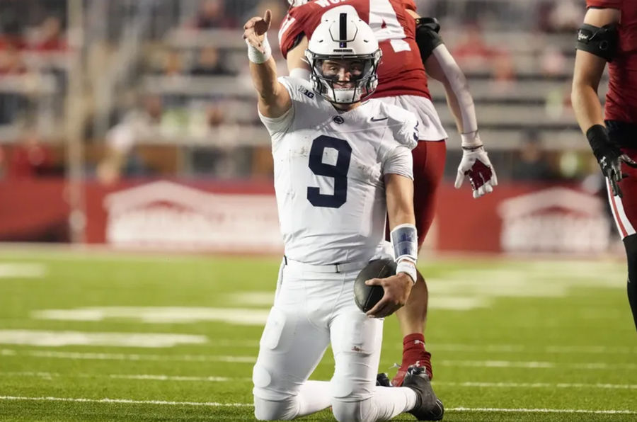 Oct 26, 2024; Madison, Wisconsin, USA; Penn State Nittany Lions quarterback Beau Pribula (9) celebrates after earning a first down during the fourth quarter against the Wisconsin Badgers at Camp Randall Stadium. Mandatory Credit: Jeff Hanisch-Imagn Images